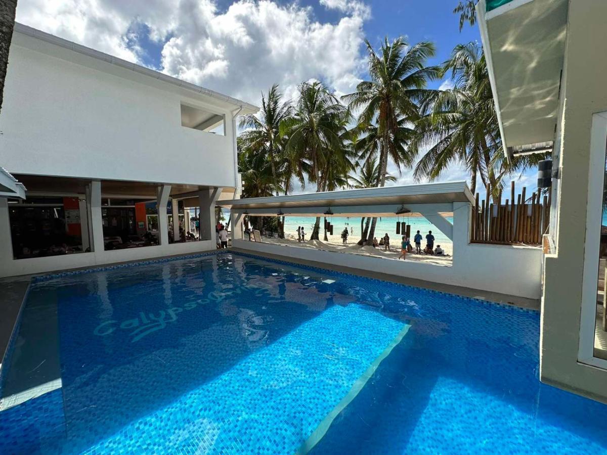 Calypso Beach And Dive Resort Manoc-Manoc Esterno foto