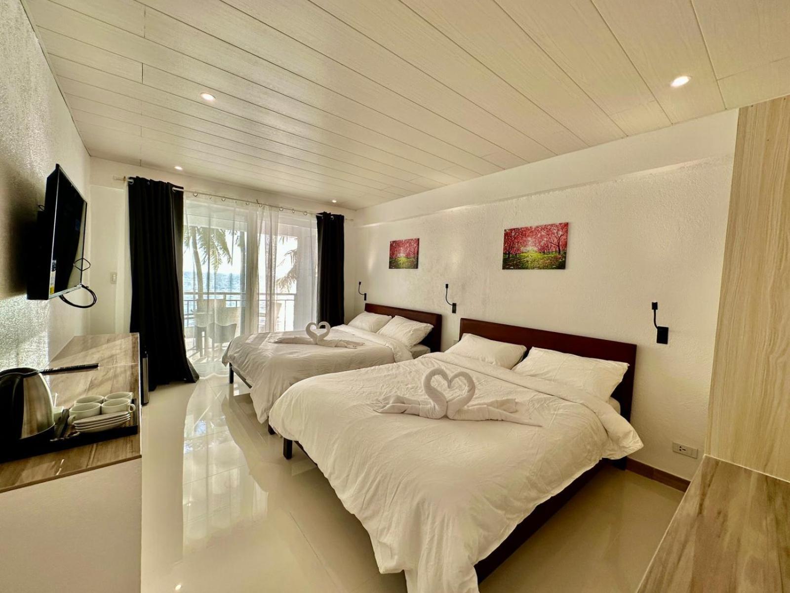 Calypso Beach And Dive Resort Manoc-Manoc Esterno foto