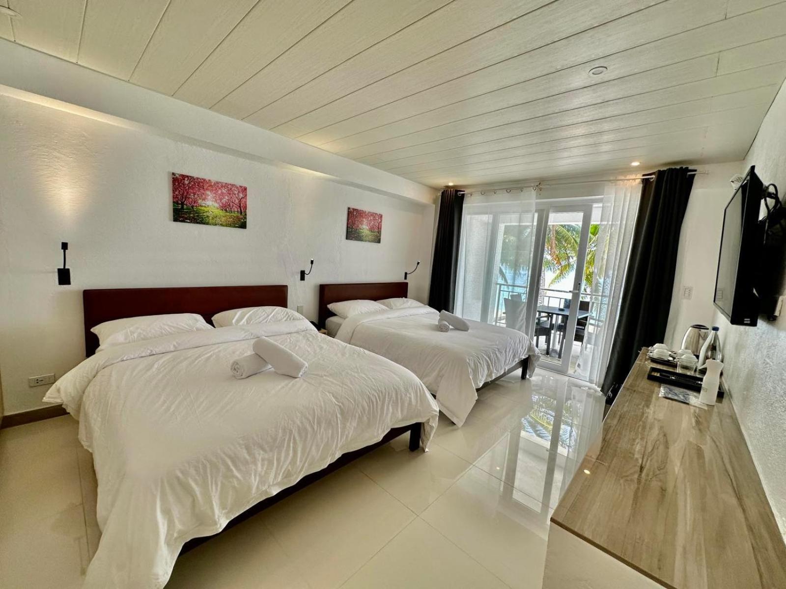 Calypso Beach And Dive Resort Manoc-Manoc Esterno foto