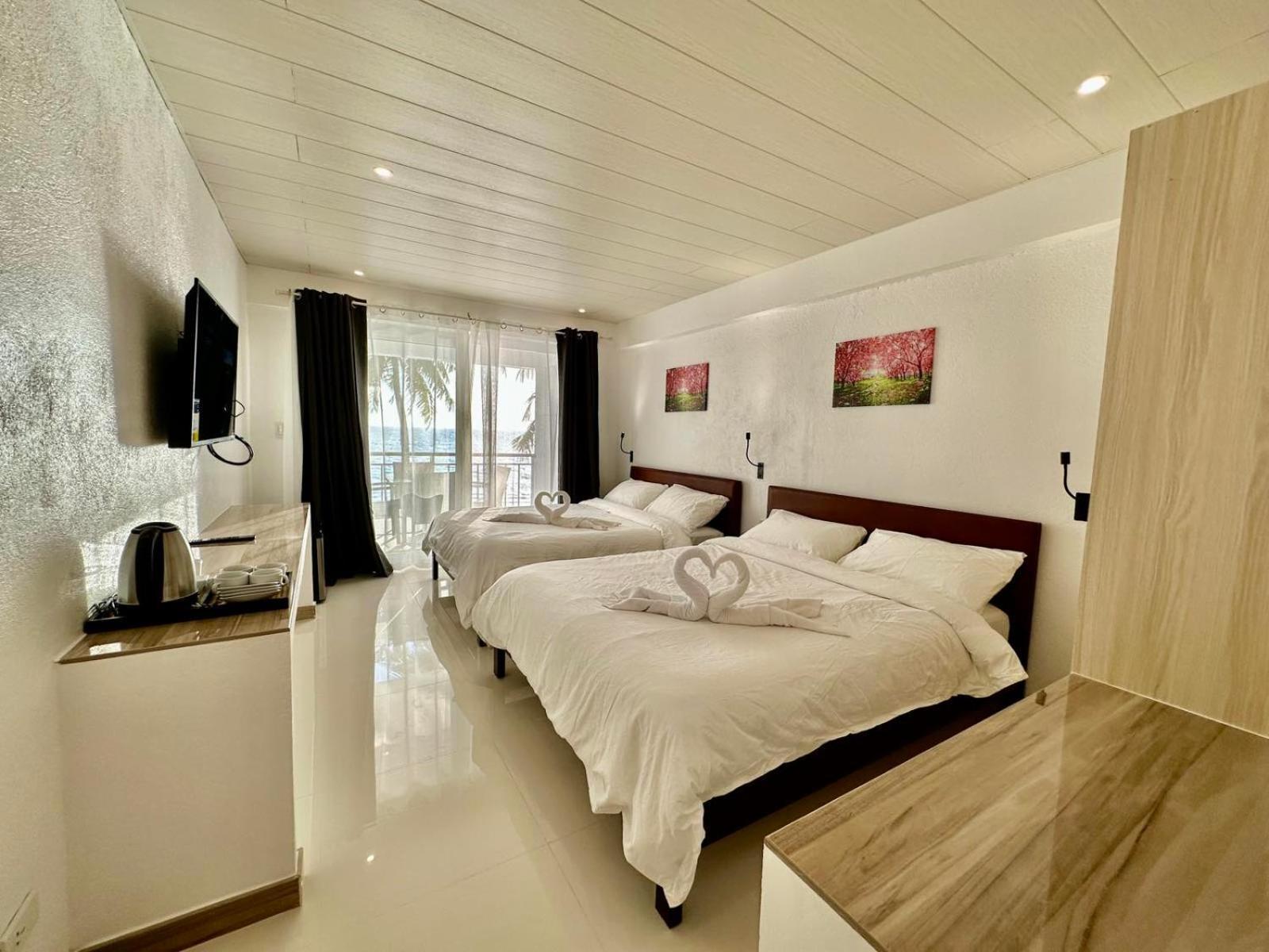 Calypso Beach And Dive Resort Manoc-Manoc Esterno foto