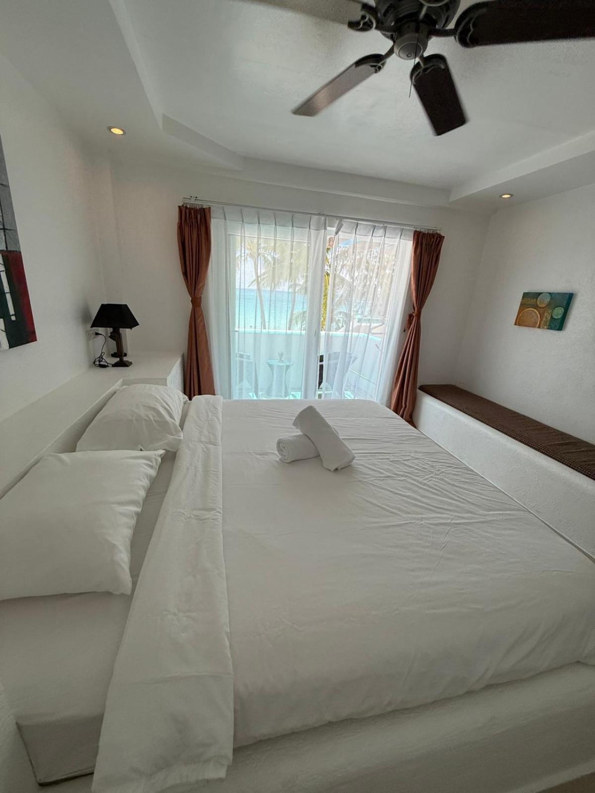 Calypso Beach And Dive Resort Manoc-Manoc Esterno foto