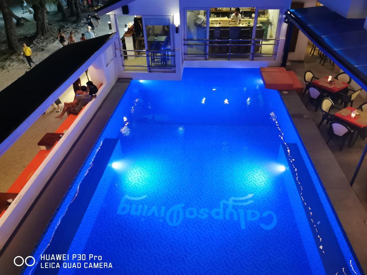 Calypso Beach And Dive Resort Manoc-Manoc Esterno foto